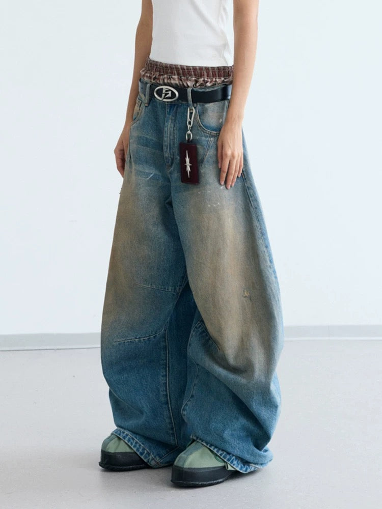 Yellow mud dyeed curved knife wide denim pants