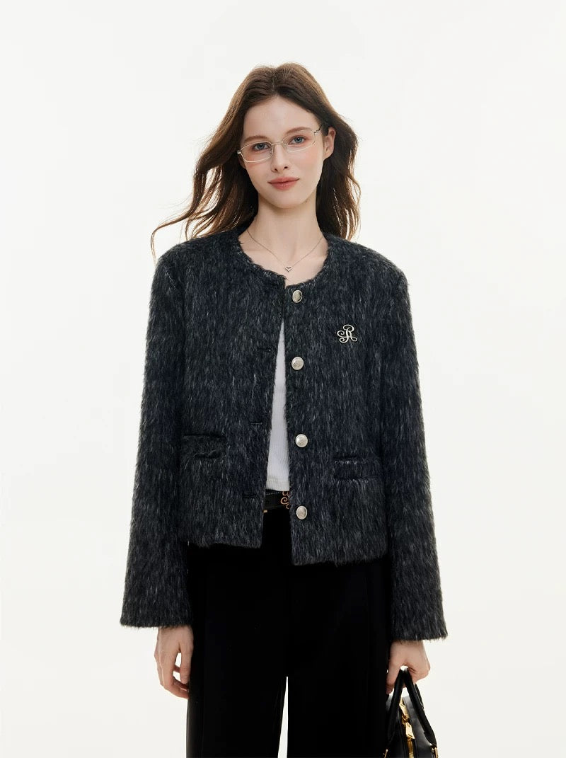 Elegant textured tweed classic jacket