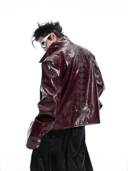 Deceptive eye spine rivet shiny leather jacket