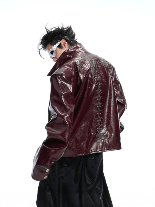 Deceptive eye spine rivet shiny leather jacket